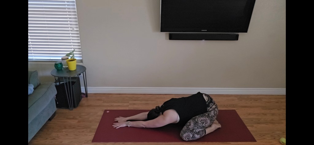 Child’s Pose beginner yoga posture for rest and relaxation