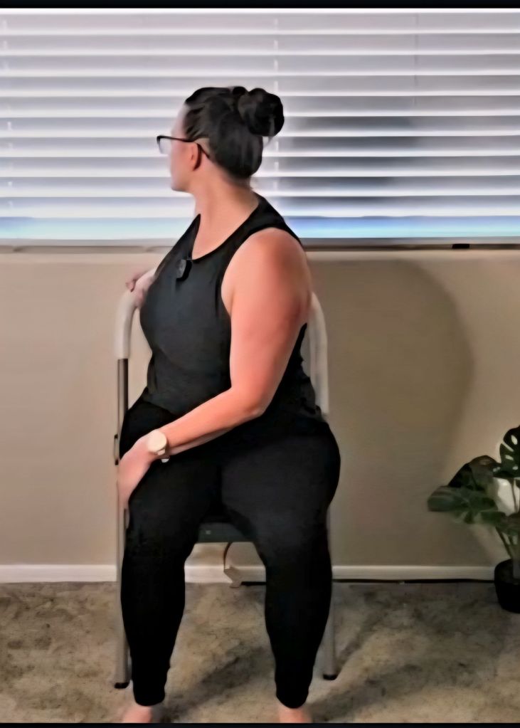 Woman practicing seated spinal twist in a chair yoga sequence for tension release and posture support.
